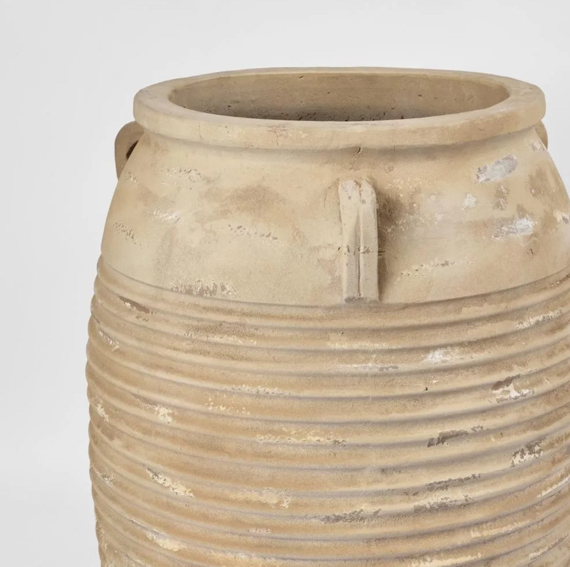 The Portsea Terracotta Pot is both elegant and sophisticated, boasting a rustic finish. Whether used on its own or paired with plants in a decorative display, this pot adds depth and dimension to any space. Its organic texture and timeless shape bring a touch of nature to your decor, perfectly complementing its natural hues.