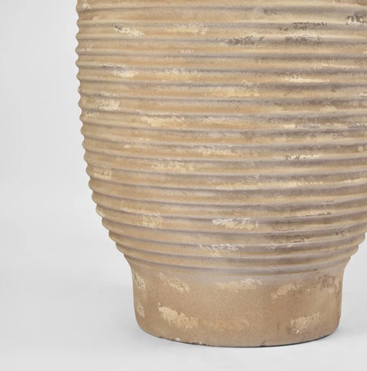 The Portsea Terracotta Pot is both elegant and sophisticated, boasting a rustic finish. Whether used on its own or paired with plants in a decorative display, this pot adds depth and dimension to any space. Its organic texture and timeless shape bring a touch of nature to your decor, perfectly complementing its natural hues.