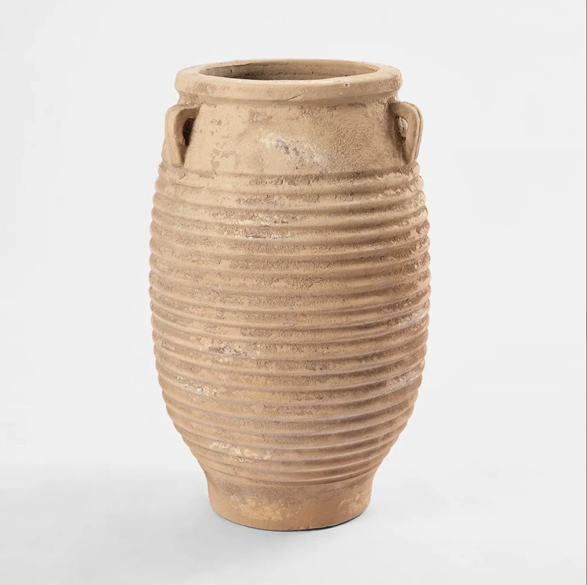 The Portsea Terracotta Pot is both elegant and sophisticated, boasting a rustic finish. Whether used on its own or paired with plants in a decorative display, this pot adds depth and dimension to any space. Its organic texture and timeless shape bring a touch of nature to your decor, perfectly complementing its natural hues.
