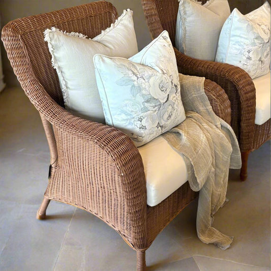 Experience the unparalleled natural style of the Kenyamanan Rattan Armchair. With traditional techniques and skilled craftsmanship, this armchair boasts a timeless design that exudes comfort and beauty. Made from rattan material, it offers a tactile and natural touch. The ergonomically constructed deep seat and high curved back guarantee maximum comfort. Enhance its style with a scatter cushion or throw to elevate your comfort to the next level.