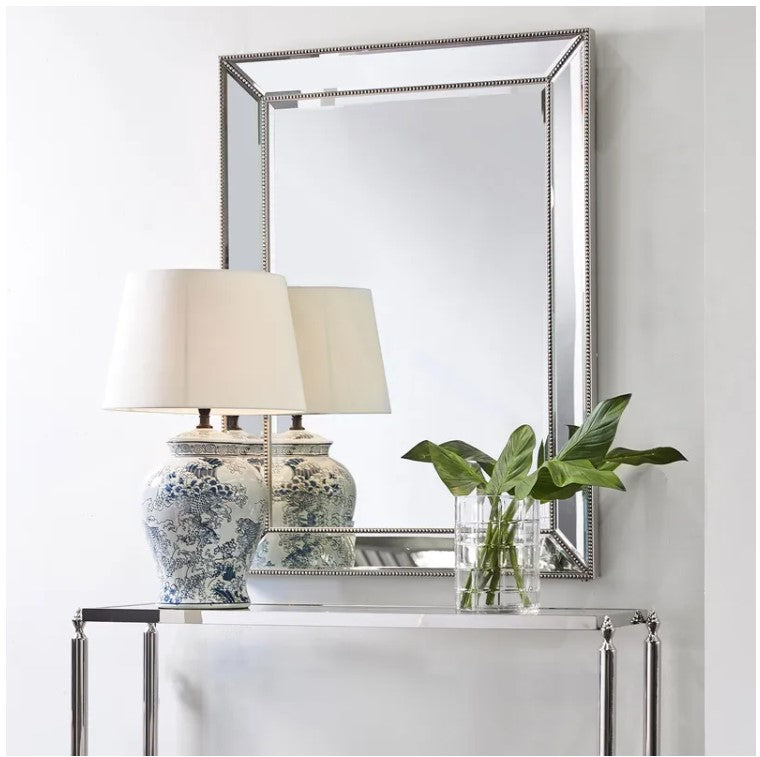 The Chloe Wall Mirror is a stunningly simple accent piece, perfect in a bedroom or living space. The bevelled mirror frames and beaded trim detailing exudes an understated elegance and brings a subtle touch of luxury to any room. The mirror is perfect as a stand-alone piece or in repetition for a larger visual effect. Styled.