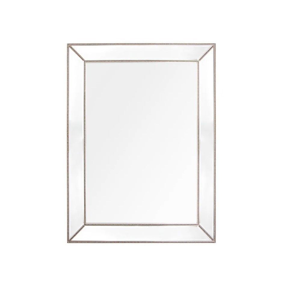 The Chloe Wall Mirror is a stunningly simple accent piece, perfect in a bedroom or living space. The bevelled mirror frames and beaded trim detailing exudes an understated elegance and brings a subtle touch of luxury to any room. The mirror is perfect as a stand-alone piece or in repetition for a larger visual effect.
