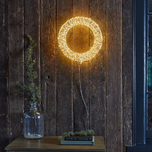 Elevate your space with the Copper Galaxy Wreath, a stunning 40cm centerpiece that combines cosmic inspiration with warm metallic tones. Its intricate design adds depth and elegance to any wall, creating a captivating focal point that draws the eye. Perfect for adding a touch of modern sophistication, this wreath transforms your home décor with its unique blend of artistry and style.