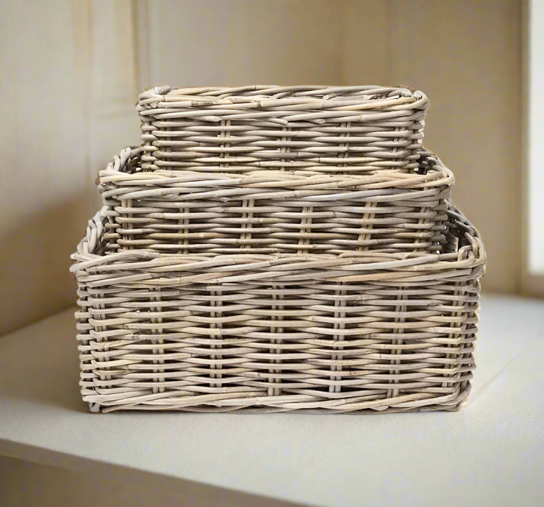Experience the perfect blend of functionality and design with this versatile classic rattan rectangular basket. Its low, straight sides and strong integrated handles make it both strong and practical. 