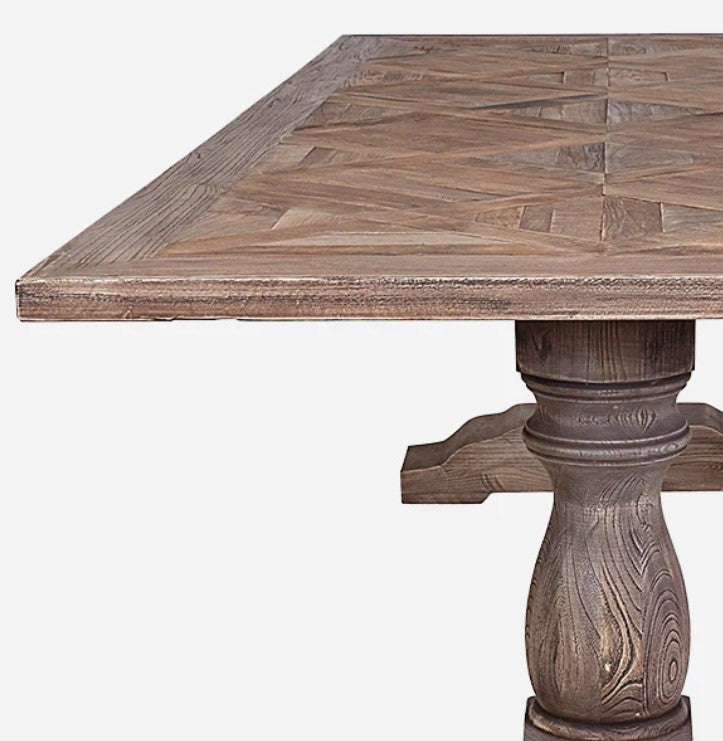 Elevate your dining experience with the Sophia Parquet Elm Dining Table - 200cm. Crafted from high-quality, recycled elm timber, this table boasts both sustainability and timeless elegance. Its unique parquetry design and sturdy pedestal base make it a visually striking and stable addition to any dining space. With ample room for family and friends to gather and enjoy unforgettable meals, this table also promotes eco-consciousness through repurposing materials. Elm timber, known for its distinctive grain pa