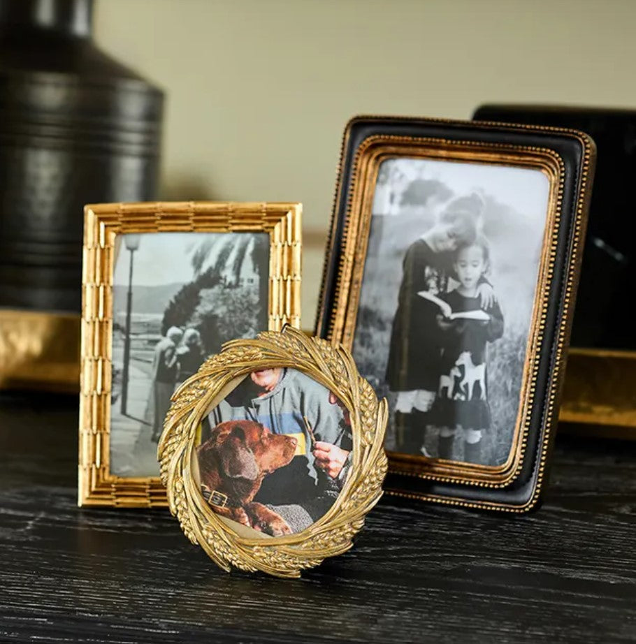 This elegant Beaded Black & Gold Photo Frame showcases a classic black and gold beaded pattern, bringing a sense of warmth and sophistication to any space. Its timeless design perfectly enhances your treasured photos or artwork, making every memory stand out beautifully.
