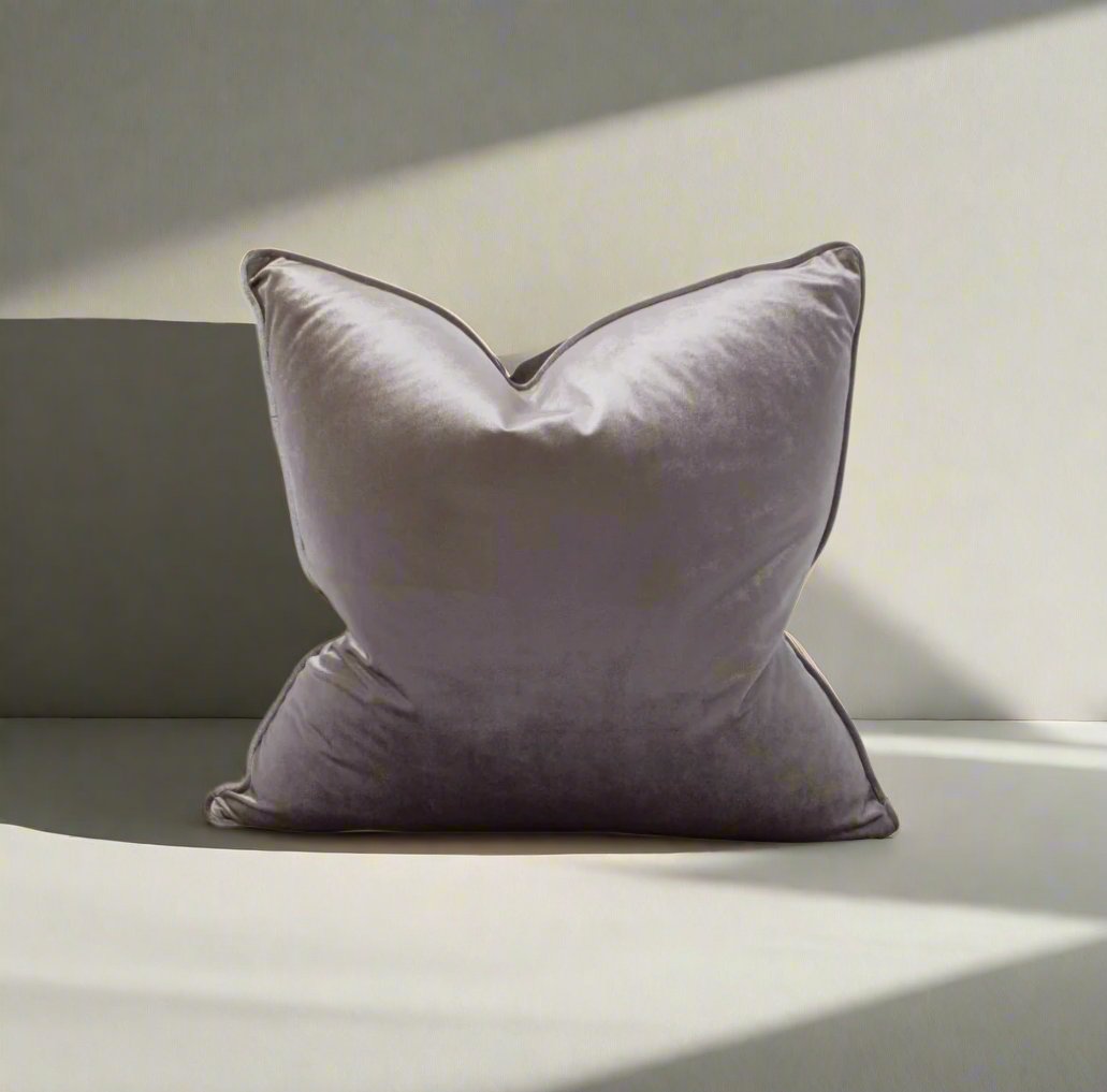 Indulge in the softness of our Steel Grey Velvet Cushion. This cushion adds style and luxury to any space, and comes with a concealed zipper for easy use. Filled with feather inserts for ultimate comfort and machine washable on a delicate cycle.