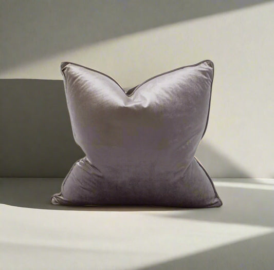 Indulge in the softness of our Steel Grey Velvet Cushion. This cushion adds style and luxury to any space, and comes with a concealed zipper for easy use. Filled with feather inserts for ultimate comfort and machine washable on a delicate cycle.