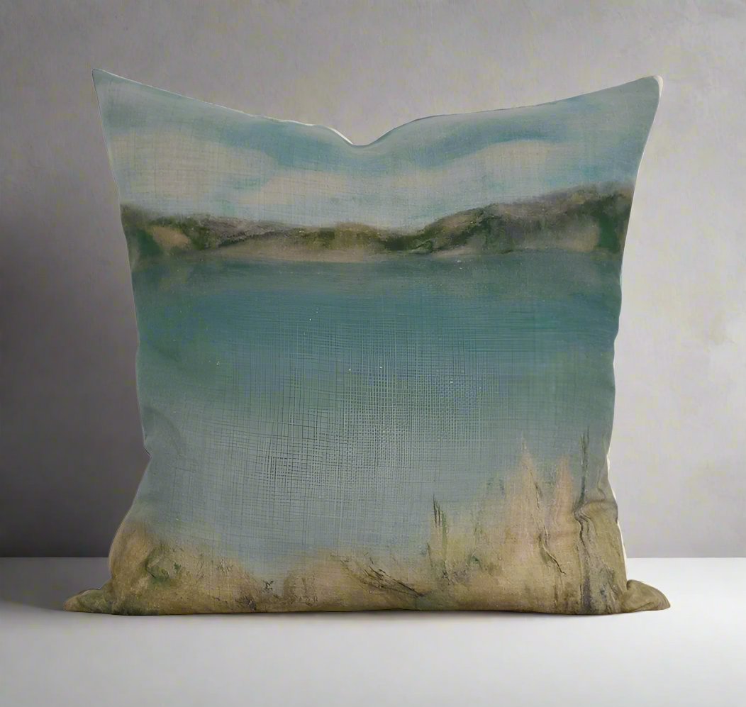 Indulge in the breath taking beauty of a tranquil beach landscape with the Island Summer Linen Cushion. Handcrafted by a local Auckland artist, the serene blues and soft hues capture the essence of New Zealand's rural settings. Perfect for any chair, this cushion is made from luxurious French organic linen and includes a feather filled insert for added comfort.