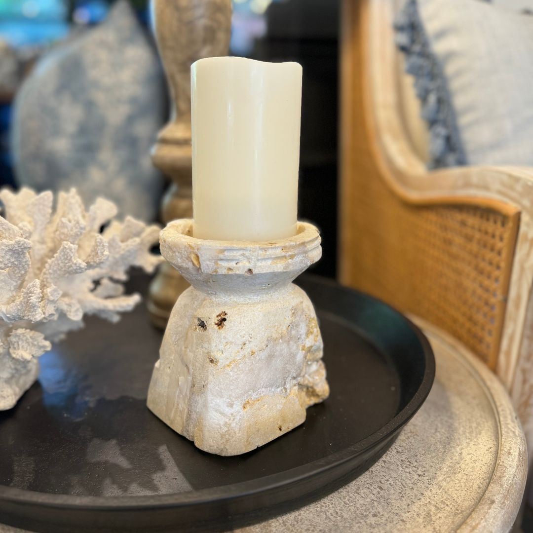The Hand-carved Sienna Onyx Candle Holder is a stylish piece, perfect as a candle holder to provide softly diffused light for a soothing ambiance. Styled.