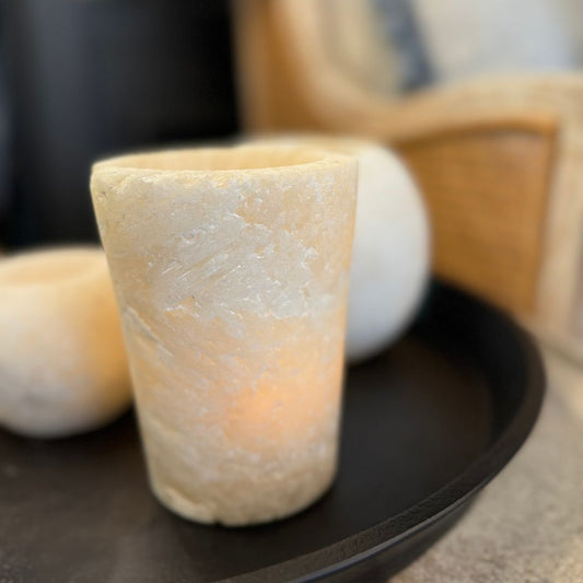 The Hand-carved Chahaya Onyx Candle Holder is an elegant candleholder with natural opaque translucence, perfect to set off your dinner table, fireplace or window ledge. Styled detail.