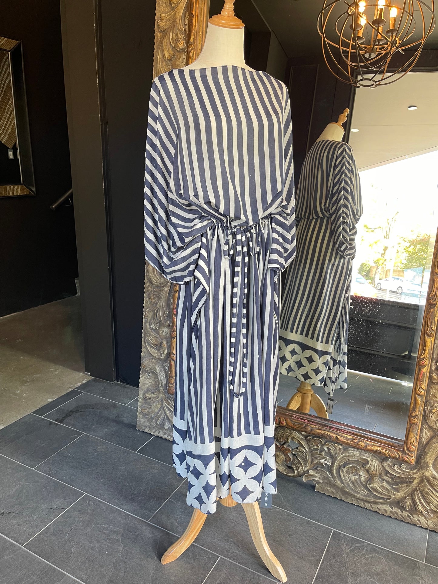 Designed by esteemed Indonesian designer Warwick Purser, this beautiful Kaftan is crafted from breathable bamboo and showcases a special pattern printed by hand using the traditional Batik printing methods of East Indonesian villages. Featuring a drawstring waistband, this Kaftan provides lightweight comfort while making it perfect for warmer climates and travelling.
