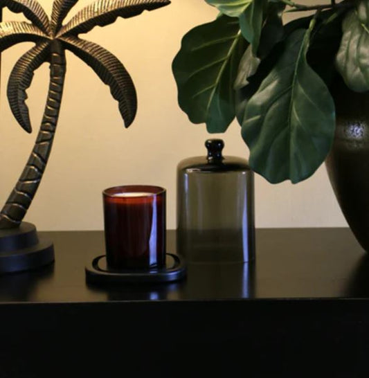 Perfect for displaying luxury candles, this smoke glass dome with black base protects fragrance while adding understated, stylish elegance to your home.