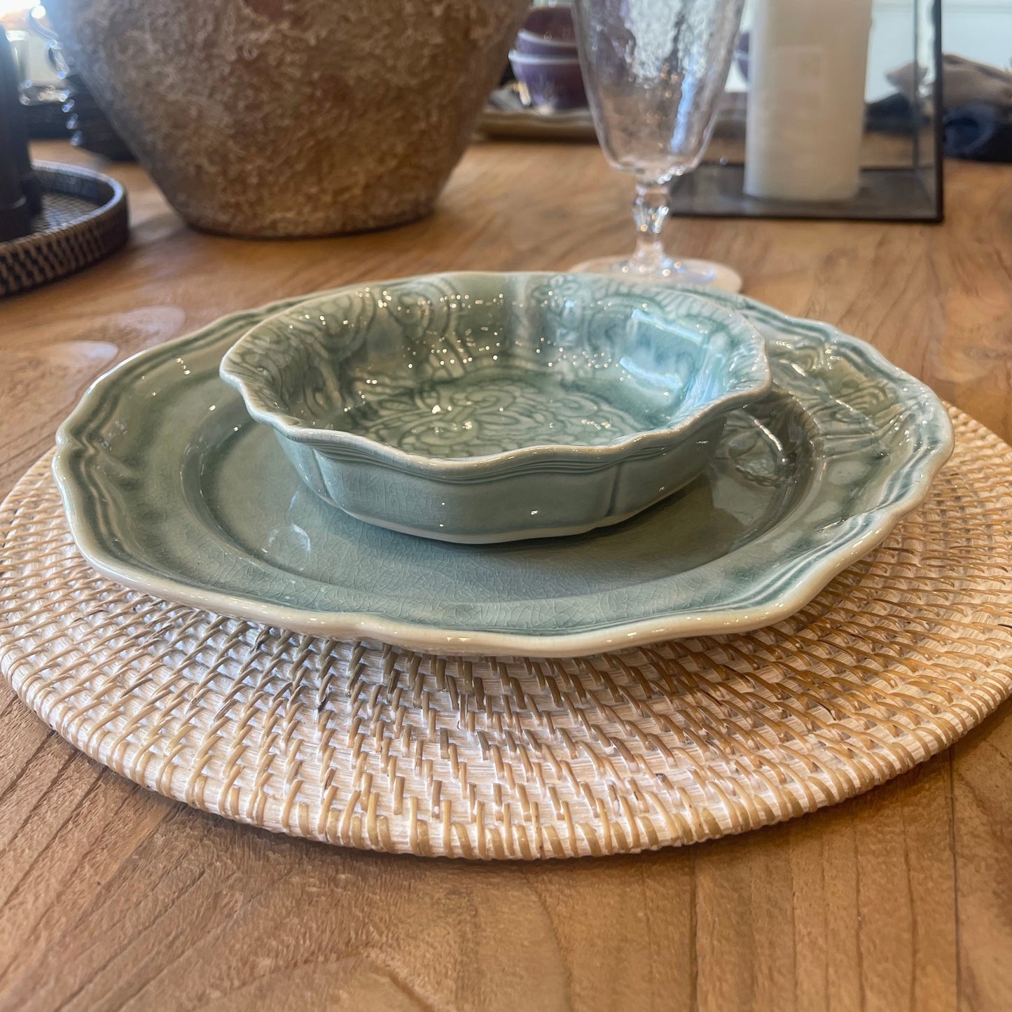 Indulge in a timeless tradition with our Handcrafted Melati White Washed Rattan Placemat. Artfully crafted in Indonesia, where basket-weaving dates back centuries, the placemat adds a rustic charm to any dining setting. Its white wash finish provides a polished touch, expertly protecting surfaces while complementing tableware. Styled.