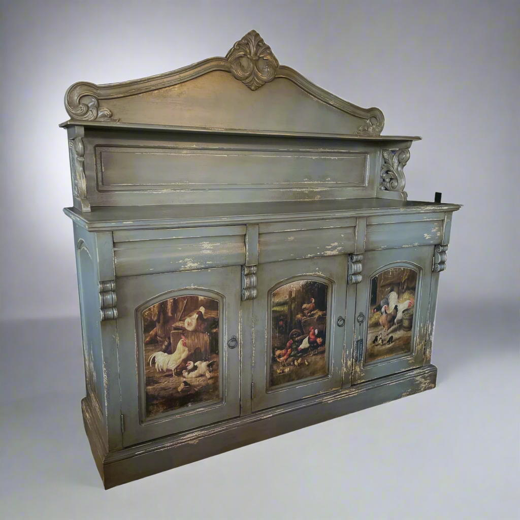 Gifted artisans in Java have crafted this one-of-a-kind furniture piece that boasts a lightly-distressed, aged look with hand-painted chickens. Meticulously carved from mahogany, this exquisite item is certain to be a cherished family heirloom. It features 3 doors and 3 drawers. Front