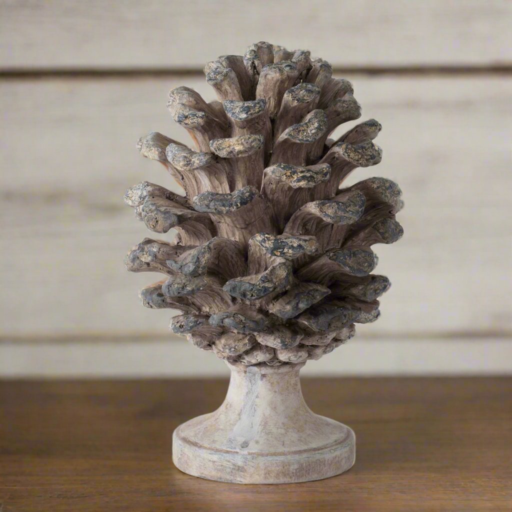 This lovely pine cone ornament will enhance your home's decor. Place it anywhere you would like to add a natural touch to your home.