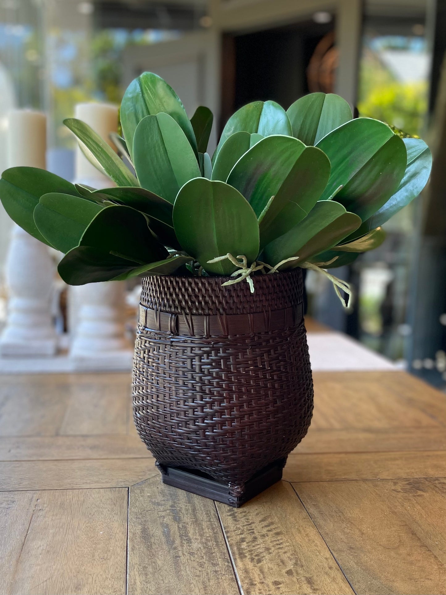Handcrafted in traditional East Indonesian village communities, this stunning & unique Bakti Handmade Rattan & Bamboo Basket combines the natural beauty of rattan & bamboo to add texture and charm to your living space. The deep brown and black tones of the bamboo base make it perfect for storage, displaying plants, or simply as an eye-catching accent piece. Styled.