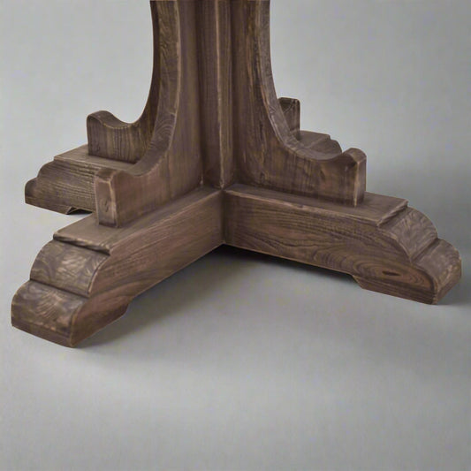 The beautiful craftsmanship takes center stage in the Lyon Round Dining Table. Constructed from Natural Elm, this table brings both form and function to your dining space with its traditional round shape. Detail