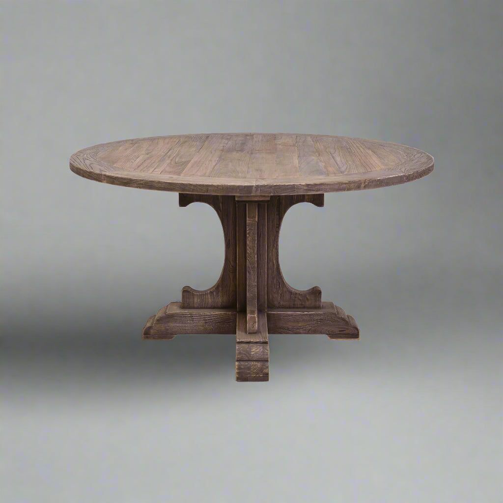 The beautiful craftsmanship takes center stage in the Lyon Round Dining Table. Constructed from Natural Elm, this table brings both form and function to your dining space with its traditional round shape. Front