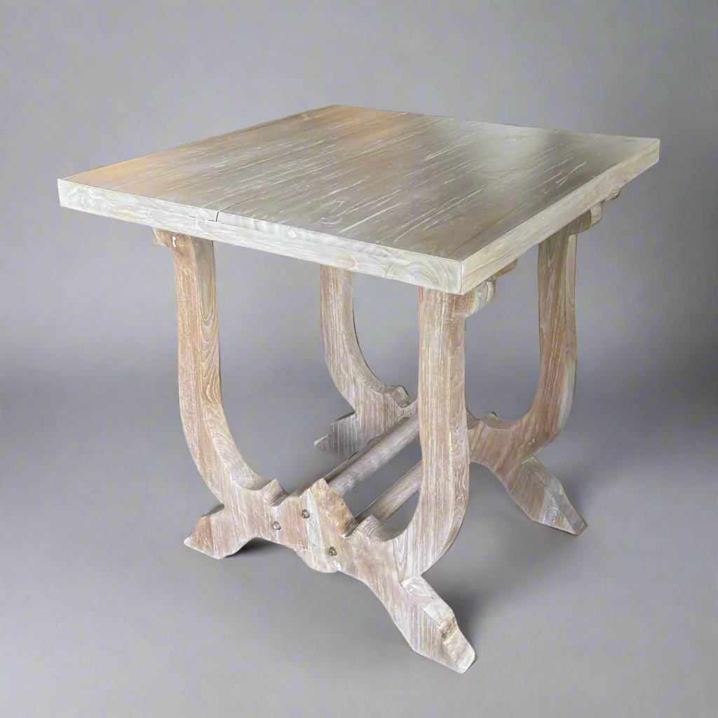 Our Odeon Console Table has unique architectural details that bring a rustic playfulness to your space. Inspired by a traditional console, the wood frame is finished with light grey undertones, adding versatility and depth to its overall aesthetic. Front