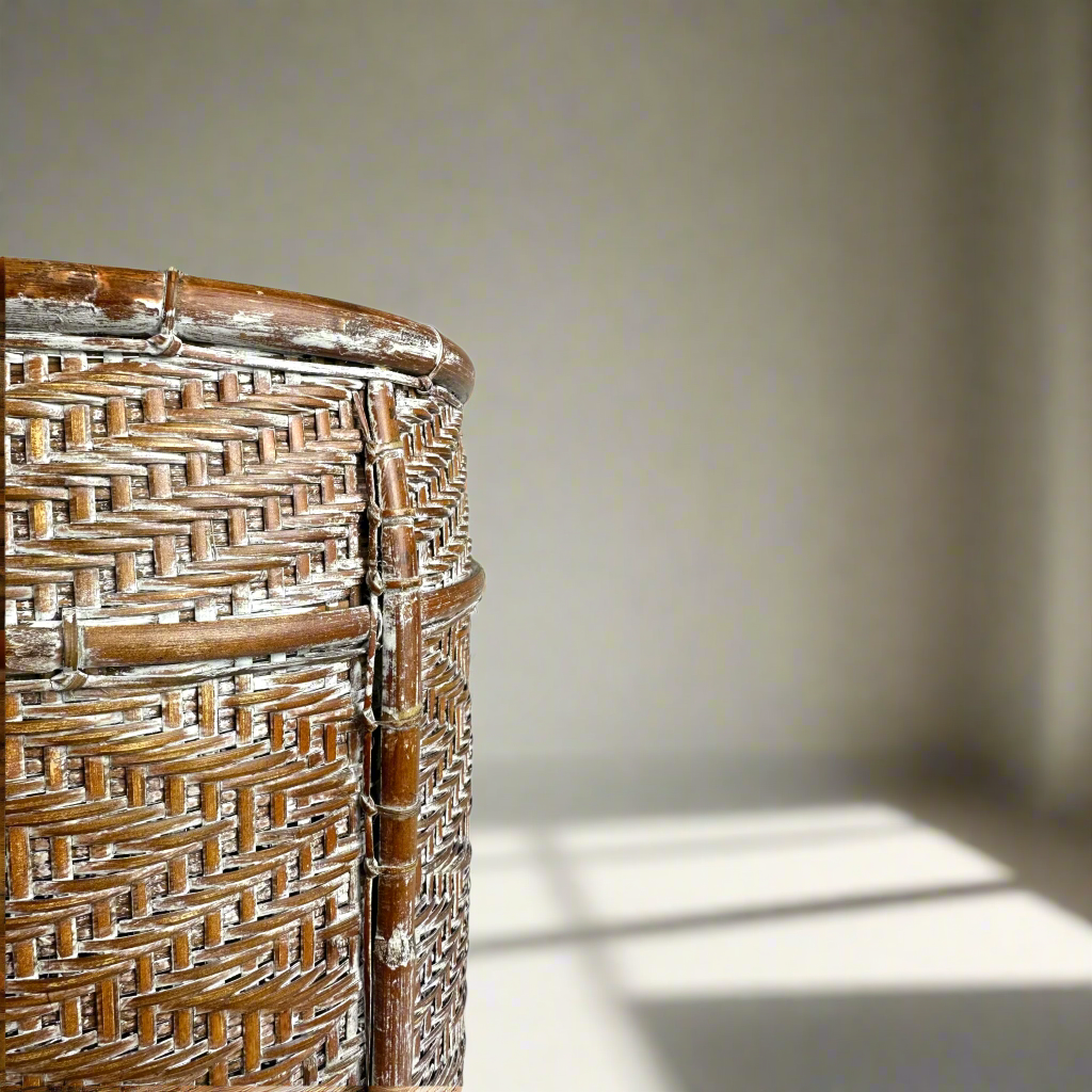 Crafted in a number of East Indonesian Island Villages, this striking Amisha Handwoven Bamboo & Rattan Basket can be used as an accent piece or to provide additional useful storage. Close up.
