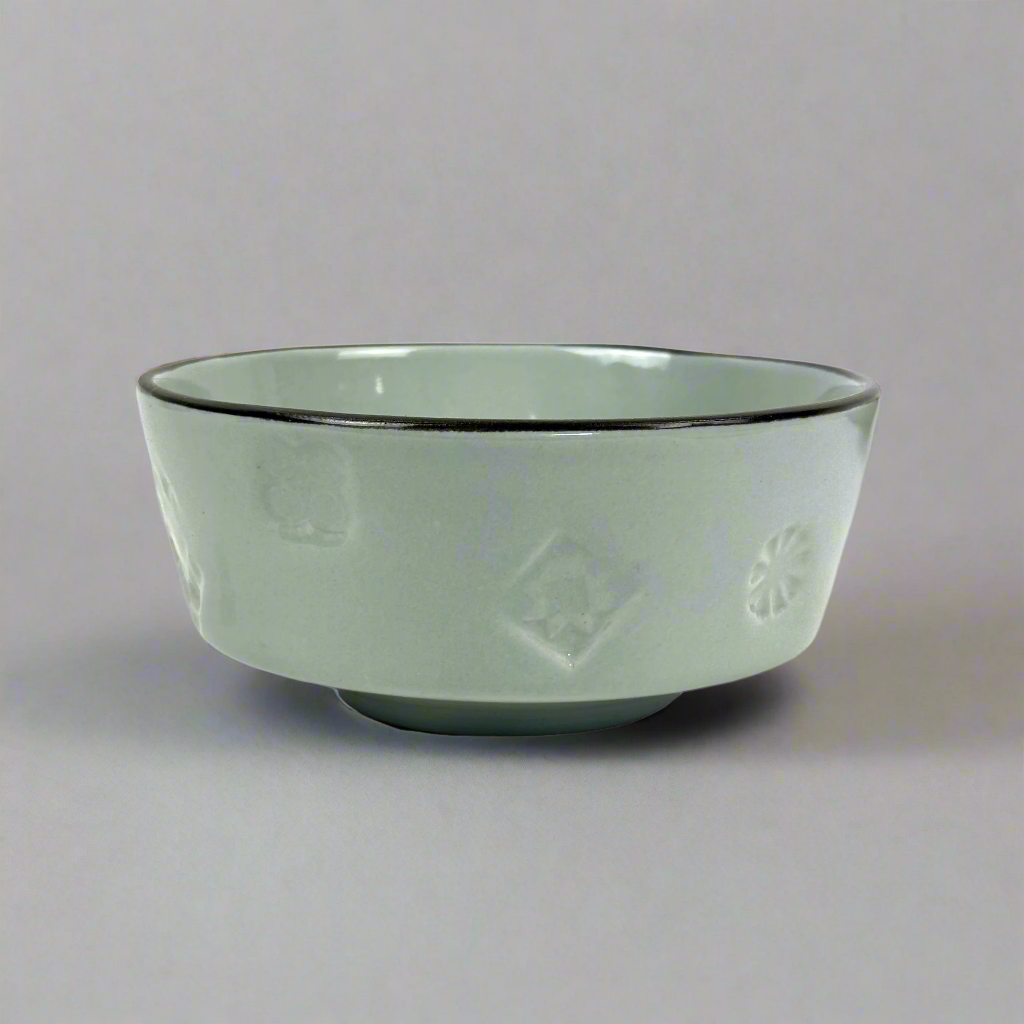 Add a subtle elegance to your dinner table with the Domah Side Bowl. Its lightly-coloured design is accented with distinctive grey edges and features the unique symbolism of Indonesian archipelagos. Crafted exclusively by HOME by MB, this bowl offers a timeless look that instantly upgrades any home décor.