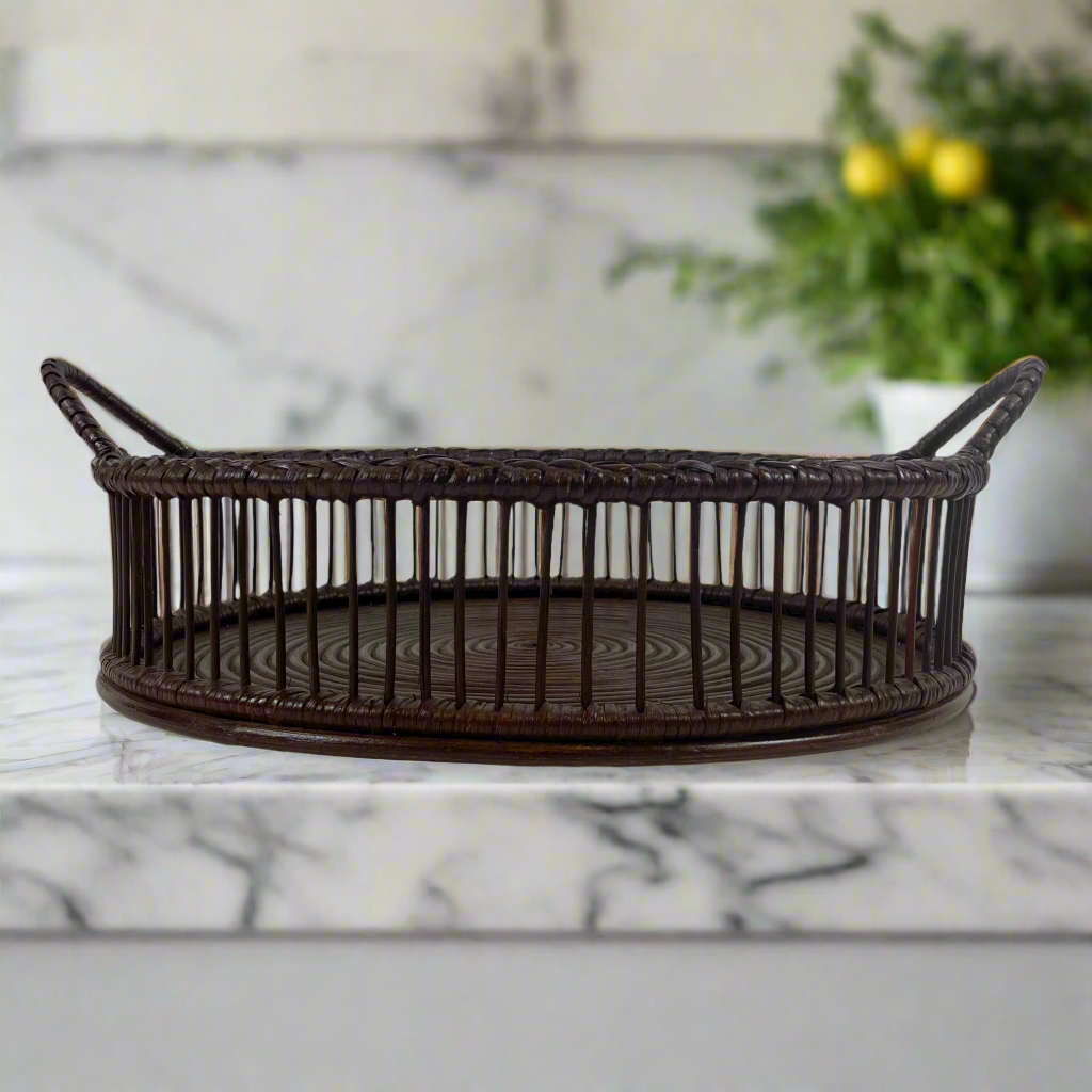 Maximize the fashionable potential of any area with our Nouveau Dark Chocolate Round Rattan Tray. Constructed from woven rattan, this truly versatile item adds a hint of natural refinement to any living space - combining functionality with elegance. Front