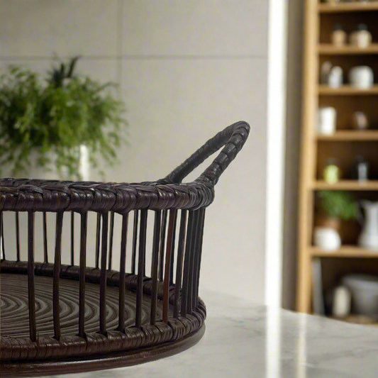 Maximize the fashionable potential of any area with our Nouveau Dark Chocolate Round Rattan Tray. Constructed from woven rattan, this truly versatile item adds a hint of natural refinement to any living space - combining functionality with elegance. Corner