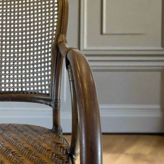 Constructed with an impressive antique finished bamboo frame, the Baik Chair has been designed with a comfortable rattan backing and a natural woven seat to provide maximum support while being stylish and chic. Detail