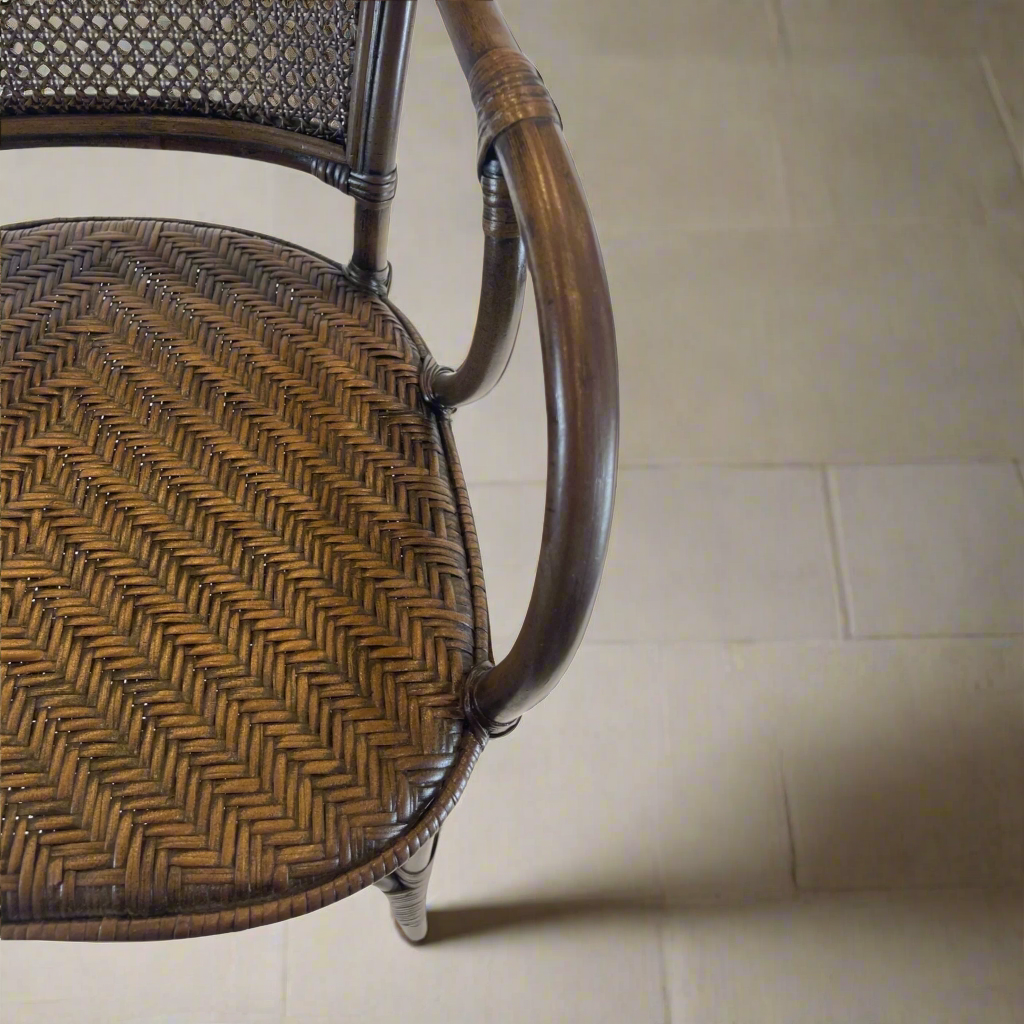 Constructed with an impressive antique finished bamboo frame, the Baik Chair has been designed with a comfortable rattan backing and a natural woven seat to provide maximum support while being stylish and chic. Detail