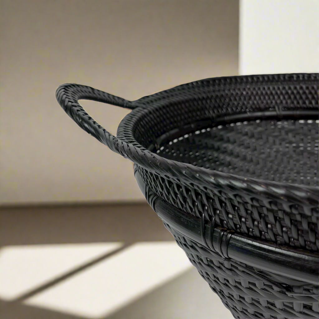 Crafted in remote East Indonesian Island Villages, the striking Basuki Handwoven Rattan & Bamboo Basket can be used as an accent piece or to provide additional useful storage. Close up detail.