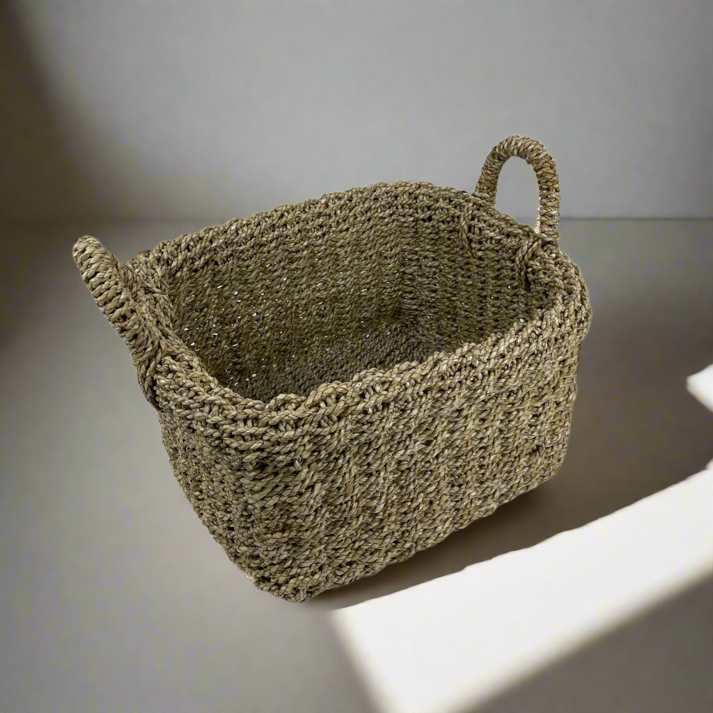 Tightly handwoven from seagrass, our Saudari Seagrass Baskets feature sturdy handles which add charm and understated style. Use to display indoor plants or for a wide range of storage options. Single.