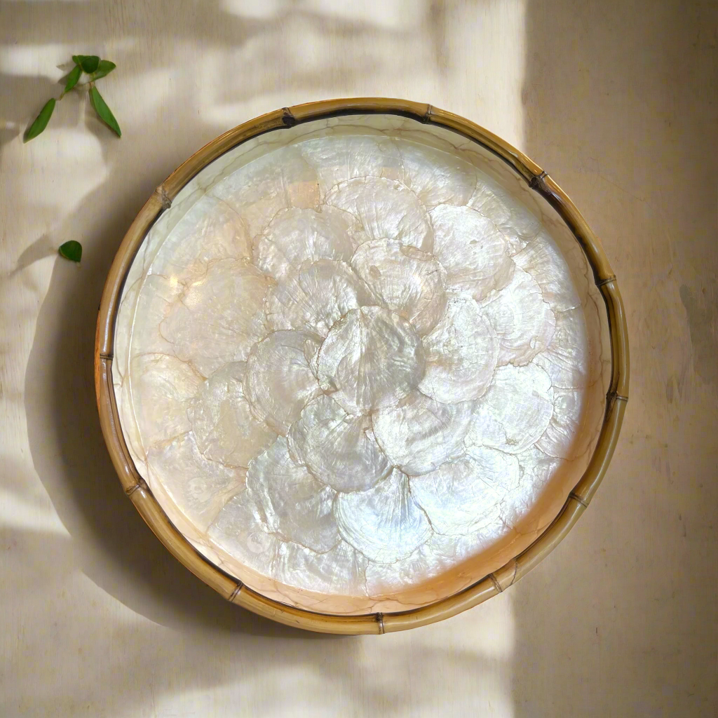 Our beautiful Capiz & Bamboo Round Tray is sleek and elegant, easy to style on your console or coffee table. Top