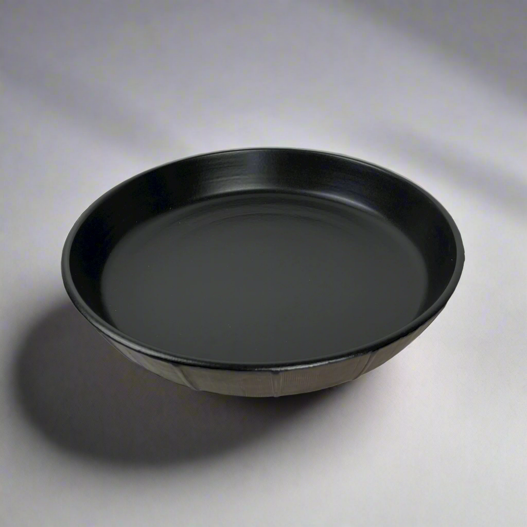 The Positano Bronze Serving Bowl boasts elegant rich tones & a versatile shape perfect for adorning your everyday table with timeless style. Top.