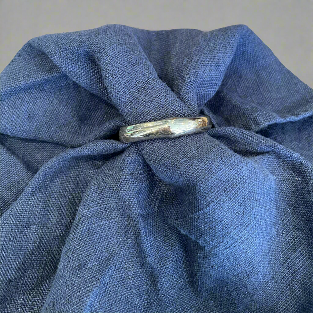 Our brass bamboo shaped napkin rings instantly elevate napkins and table settings. Front