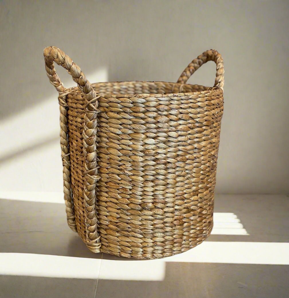 The Keranjang Water Hyacinth Basket is crafted from sustainable Water Hyacinth, bringing both practicality and beauty to your household. Whether for pantry storage or laundry, this basket has got you covered. Styled.
