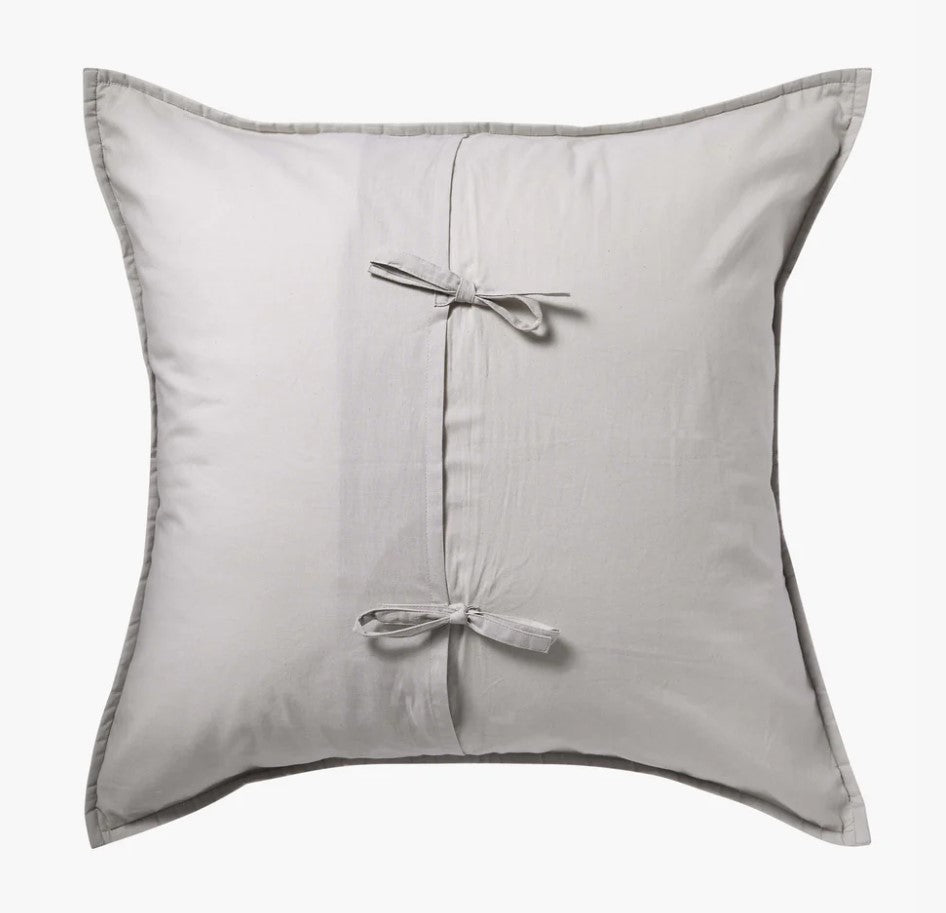 Maddox Silver European Pillowcases are an exquisite choice for luxury bedding. Crafted with 100% cotton voile and hand-embroidered with a Kantha stitch detail, this European pillowcase provides a sophisticated and plush aesthetic. Its 65cm x 65cm dimensions and tie closure on reverse make it an ideal addition to any bedroom. Back.