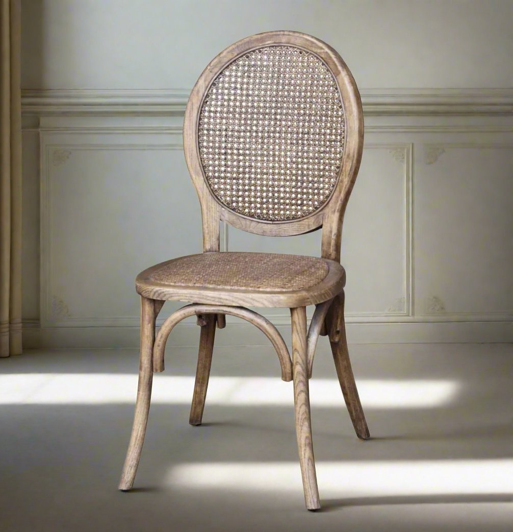 Crafted from oak, the Odette Chair lends an air of sophistication and elegance to this classic French provincial style dining or occasional chair, with its cane back providing an organic element for a refined, inviting look. Front