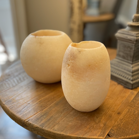 The Hand-carved Diah Onyx Candle Holder is a solid, stylish piece. Perfect as a candle holder to create softly diffused light and a soothing ambiance.