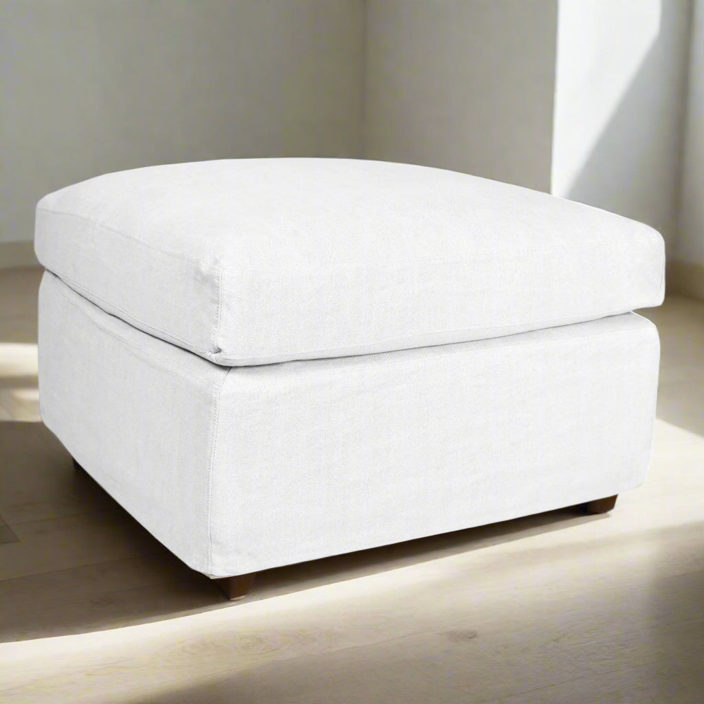 The Sorgues Slipcover Ottoman is the perfect addition to your living space. Used for extra seating, or simply styled as a pair in front of your fireplace, this ottoman adds just the right amount of lived-in comfort wherever it’s placed. Front