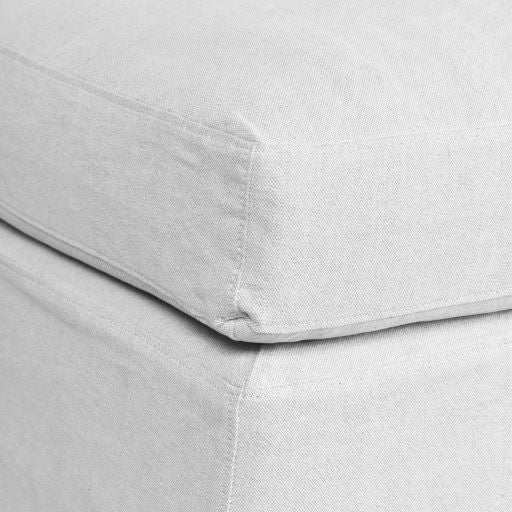 The Sorgues Slipcover Ottoman is the perfect addition to your living space. Used for extra seating, or simply styled as a pair in front of your fireplace, this ottoman adds just the right amount of lived-in comfort wherever it’s placed. Corner