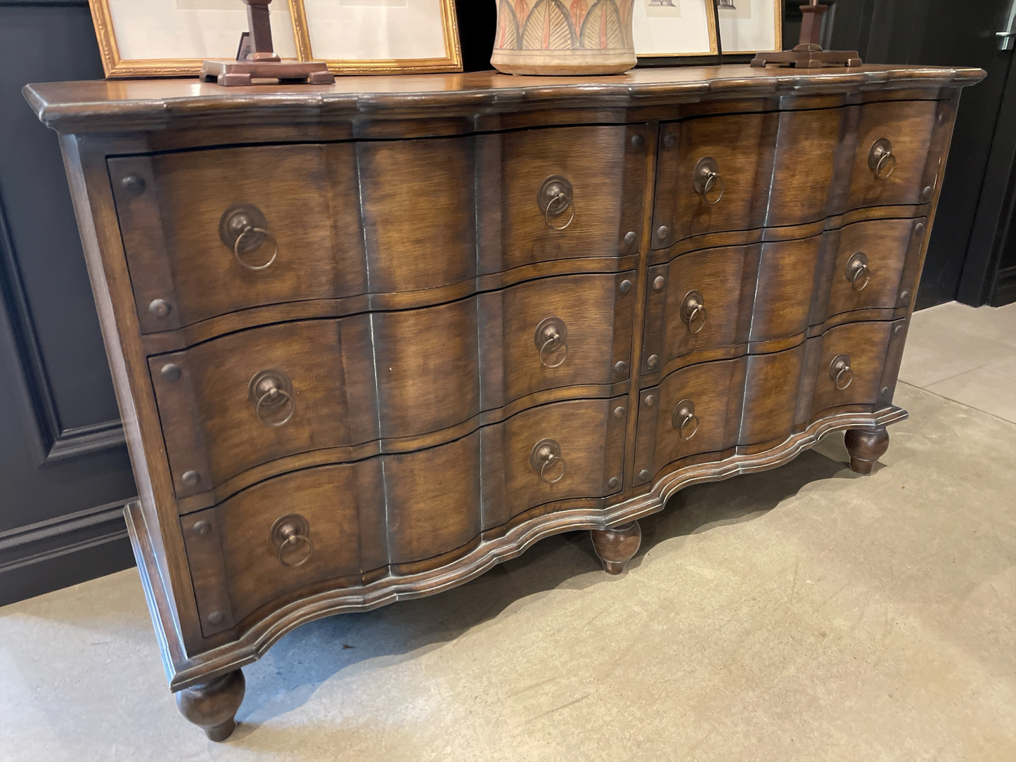 European influenced period design, artisan craftsmen have constructed this stunning and unique Commode Chest out of solid mahogany. Featuring six deep drawers and showcasing warm, rich tones, this piece is destined to become a much admired and desired future heirloom. Front