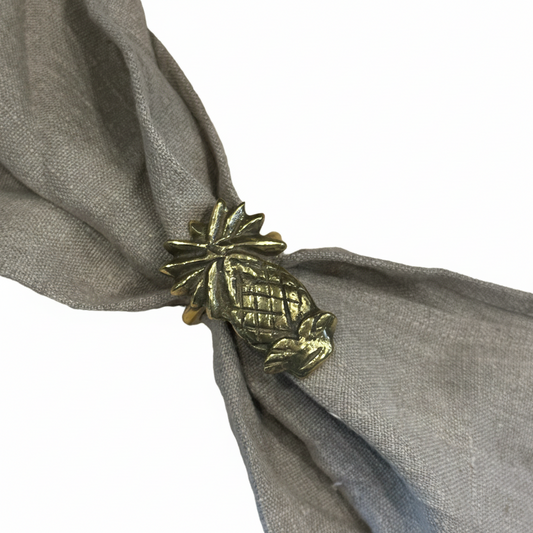 Our solid brass napkin ring. Featuring a fun Pineapple design. The perfect addition to your dining table setting. Front