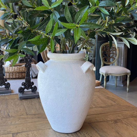 The Nimes Pot showcases a white matte textured finish that exudes a clean and timeless look, making it perfect for styling with a variety of lush greenery. Handcrafted in southeast Asia from authentic terracotta.