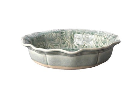 The small bowl is the prettiest shape with a gorgeous fluted top. It's shallow depth makes it ideal to serve fruit and desserts or the ideal size for a breakfast granola. Choose from the pastel colour pallet or add a sense of drama with the darker tones. All the colours are designed to enhance the presentation of the food. The bowl is handmade in Portugal and made of white stoneware clay which is fired in extremely high temperatures making it very practical and durable.
