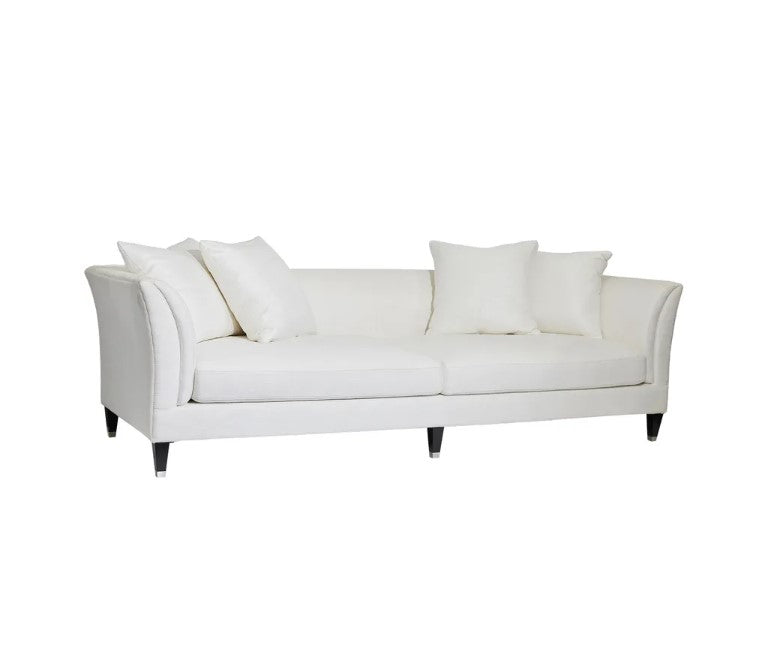 Bring sophistication and comfort to your living space with the Amalfi 3 Seater Sofa. This stylish upholstered sofa features a low-back sleek design of rounded wedge arms and superior feather and foam cushioning for unparalleled comfort. Crafted with a hardwood frame and inner spring suspension, and upholstered in ivory linen/viscose, this timeless piece is complete with silver capped timber legs. Front