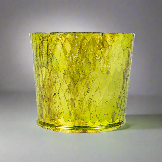 This individual piece is blown by hand with Barfi cut glass detailing in lime oxidised tones. Use this hurricane as a candleholder around the home to add warmth and luxury.