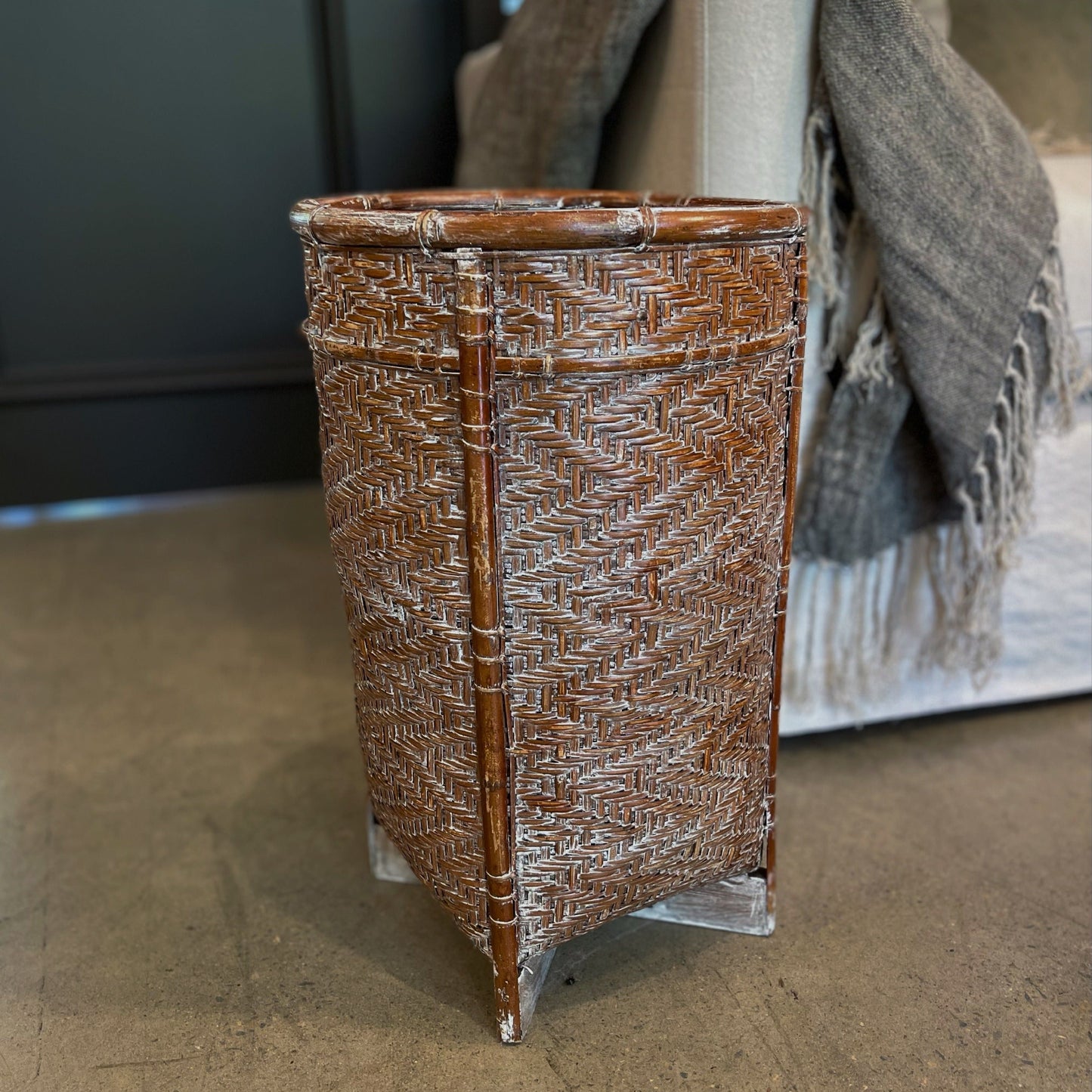 Crafted in a number of East Indonesian Island Villages, this striking Amisha Handwoven Bamboo & Rattan Basket can be used as an accent piece or to provide additional useful storage. Styled.