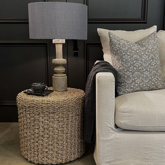 The Kursi Seagrass Side Table is a beautiful addition to seating areas or bedrooms. Woven from seagrass, the tight weave gives a dimensional quality to this table, adding a sense of movement and individuality. Front