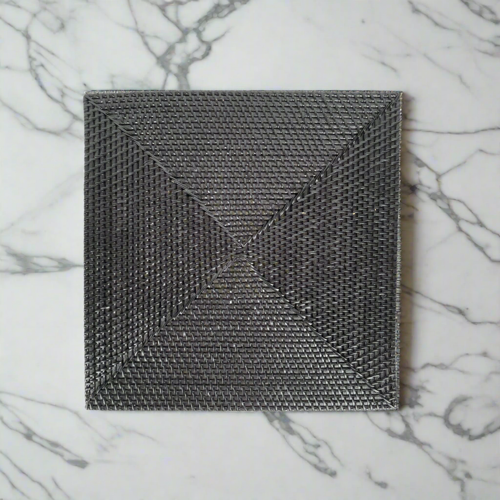 Our Handwoven Kotak Rattan Square Black Placemat offer an effective way to both decorate and protect your table.